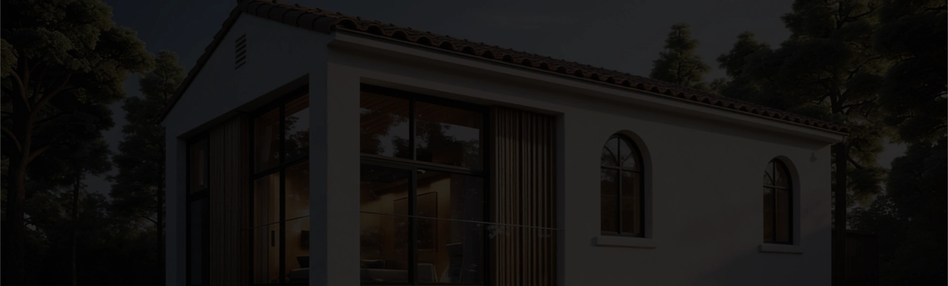 Residential backyard ADU construction project with modern exterior lighting in Los Angeles neighborhood